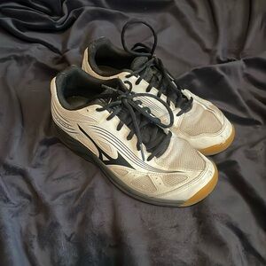 Used pair of volleyball shoes.